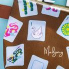 Close up of mahjong tile bag. Chic Mahjong tile bag holder – unique Mahjong gift and stylish game table accessory