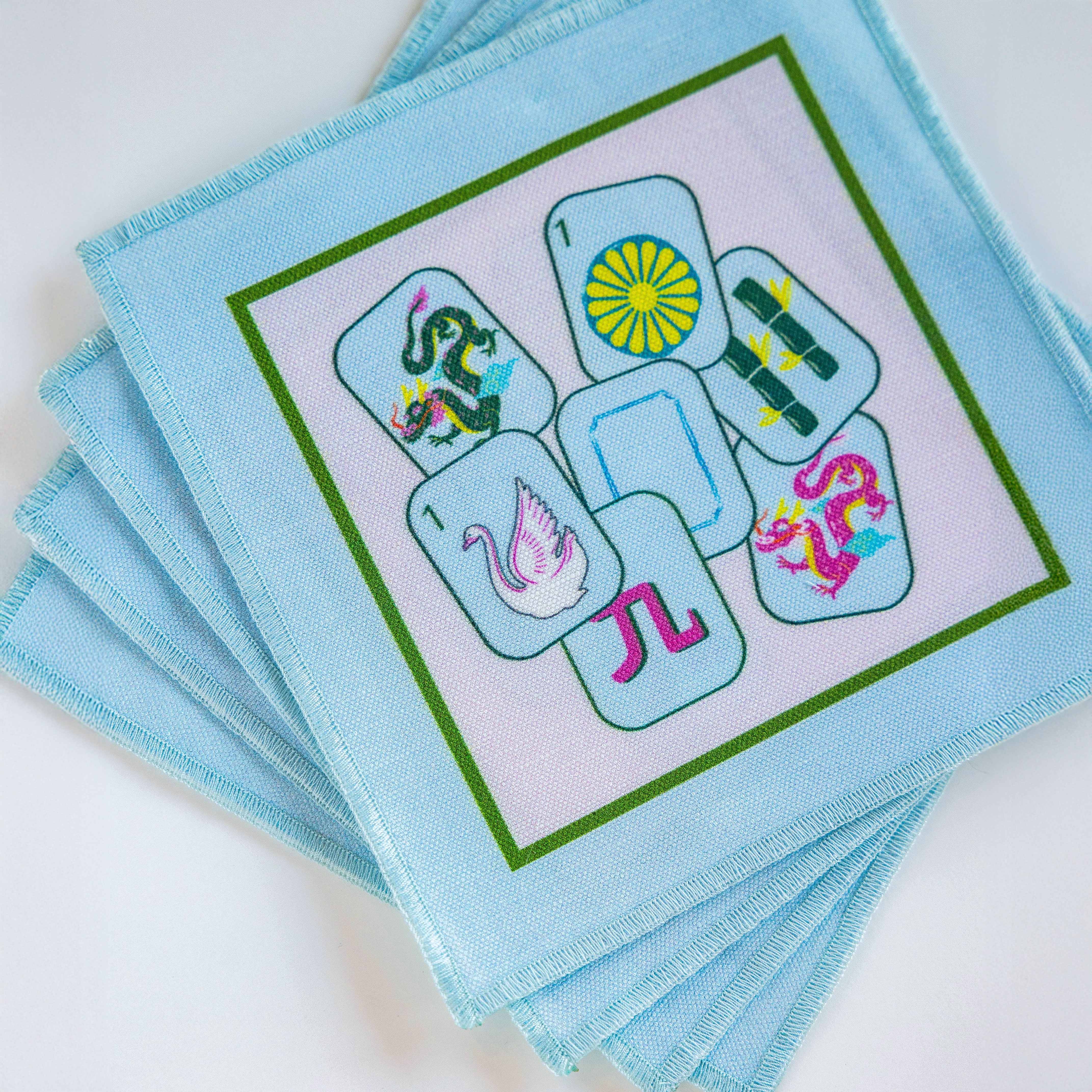 Mahjong-themed linen cocktail napkins – chic game night accessory and unique gift for Mahjong lovers & party hosts.